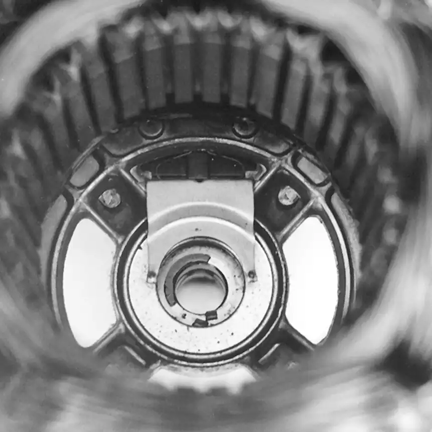Stationary part of centrifugal switch in stator end bell